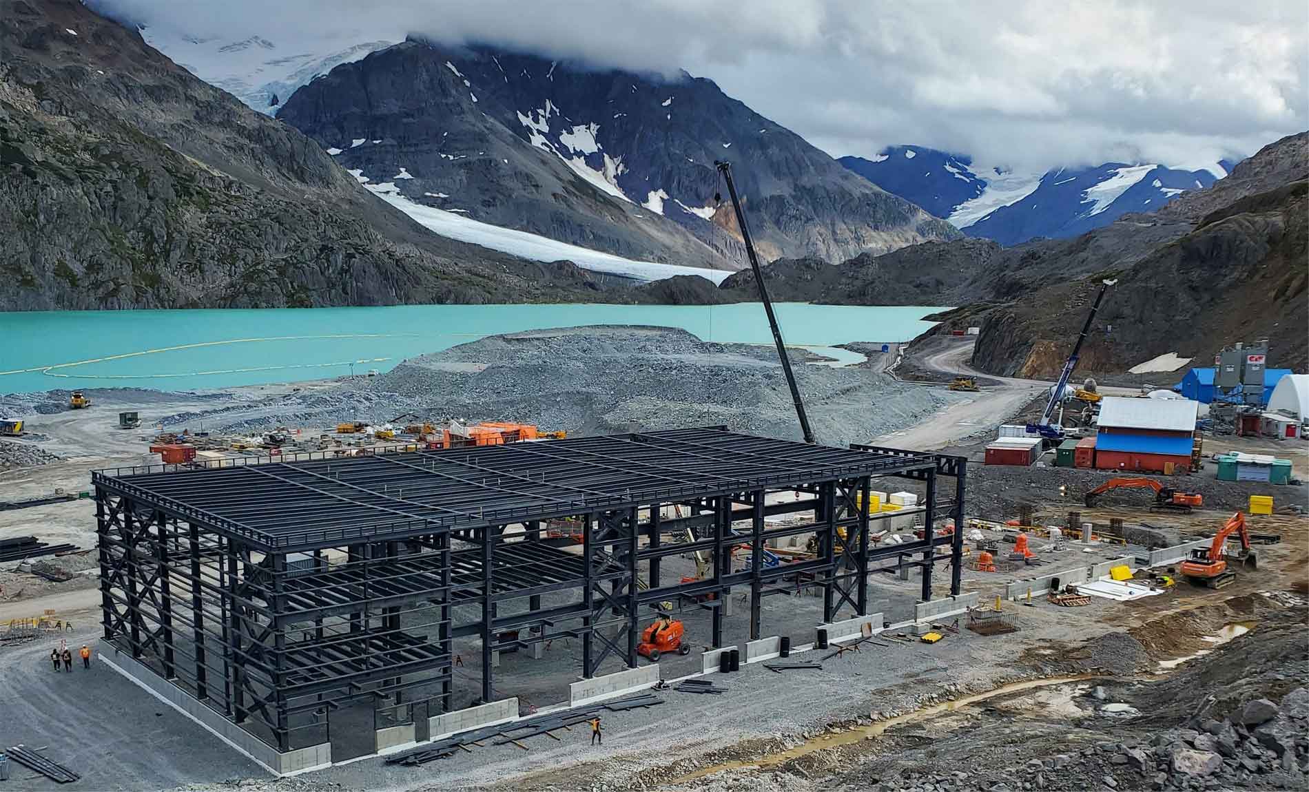 Brucejack Mine Worksite with glacier lake and mountains in background