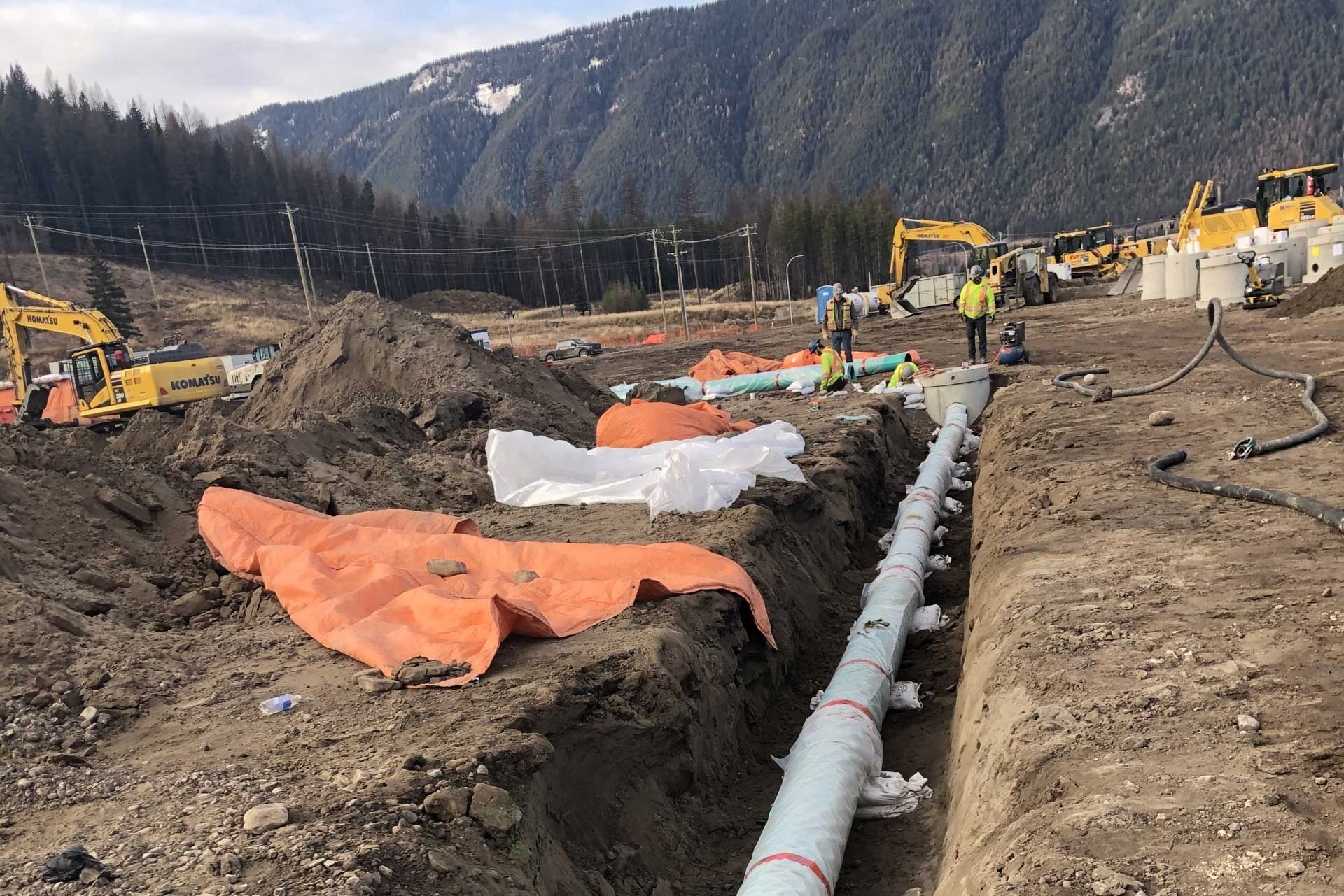 Piping prepared to be buried in concrete at the Komatsu Manufacturing Plant