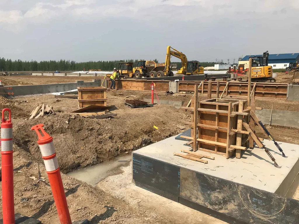 Concrete foundations being prepared and poured